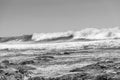 Waves and rocks during rain and rough weather Royalty Free Stock Photo