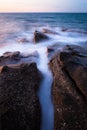 Waves and rocks shore long exposure