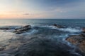 Waves and rocks shore long exposure Royalty Free Stock Photo