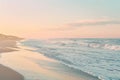 Waves rolling onto a sandy beach under a pastel sunset sky, A peaceful beach at sunset, with pastel skies and gentle waves Royalty Free Stock Photo