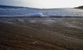 Waves rolling over sea shore Royalty Free Stock Photo