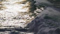 Waves rolling shiny surface in super slow motion. Powerful sea surf barreling Royalty Free Stock Photo