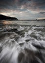 Waves rushing over rocks