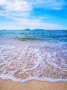 Waves rushing to the sandy beach Royalty Free Stock Photo