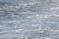 Marine background. Waves on the sea. The sea is stormy. Sea foam. Royalty Free Stock Photo