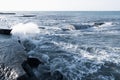 The waves crash on the old pier. seascape. Marine background. Sea spray. Royalty Free Stock Photo