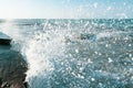 The waves crash on the old pier. seascape. Marine background. Sea spray. Royalty Free Stock Photo