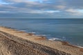 The waves in the sea create strange shapes in the pebble beach at Seaton in Devon on the Jurassic coast of Lyme Bay