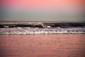 Waves at sea on dramatic sunset background. Waves at sea during storm and wind.