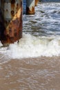 The waves in the seaside resort of Zinnowitz on the island of Usedom surround the great pier Royalty Free Stock Photo