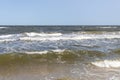 The waves in the seaside resort of Zinnowitz on the island of Usedom surround the great pier Royalty Free Stock Photo