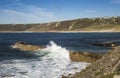 Waves at Sennen Cove pier in Cornwall Royalty Free Stock Photo