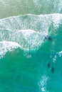 waves on the shore of a beach, turquoise sea water. Top view with drone Royalty Free Stock Photo