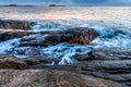 Waves at the shore in Helleviga recreation area, blue hour in South Norway