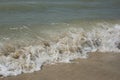 Waves on the shore of the Sea of Azov beach. Waves run to the seashore.