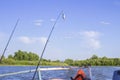 Waves from a small wooden motor boat while searching for a drowned man Royalty Free Stock Photo