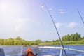 Waves from a small wooden motor boat while searching for a drowned man Royalty Free Stock Photo