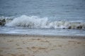 Waves smashing onto beach