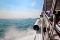 Waves from a speedboat on the blue sea with splashes and a trail from a boat or yacht. The concept of travel and voyage while on