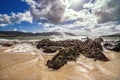 Waves splashes on a beach in County Cork Royalty Free Stock Photo