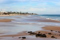 Waves splashing on basalt rocks at Ocean beach Bunbury Western Australia