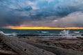 Waves splashing at Whidbey Island beach during sunset Royalty Free Stock Photo