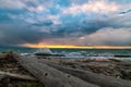 Waves splashing at Whidbey Island beach during sunset Royalty Free Stock Photo