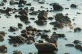 Waves on stone beach waters edge abstract sea background.Thailand Royalty Free Stock Photo