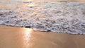 Waves on the sunset beach