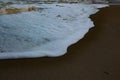 Waves sweeping against the beach Royalty Free Stock Photo