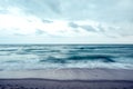 Waves on tropical white beach with blue sky Royalty Free Stock Photo