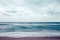 Waves on tropical white beach with blue sky Royalty Free Stock Photo