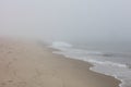 Fog and Sandy Beach in New England Royalty Free Stock Photo