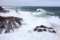 Sea storm at rocky coast