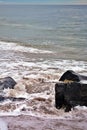 Waves Washing Up Around Jetty Rocks