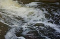 Waves of water of the river and the sea meet each other during high tide and low tide. Deep blue stormy sea water Royalty Free Stock Photo