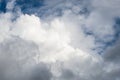 Waves of white fluffy clouds against the blue sky Royalty Free Stock Photo