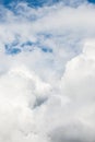 Waves of white fluffy clouds against the blue sky Royalty Free Stock Photo