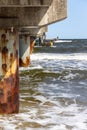 The waves in the seaside resort of Zinnowitz on the island of Usedom surround the great pier Royalty Free Stock Photo