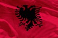 Waving Albania flag for using as texture or background, the flag is fluttering on the wind