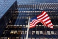 Waving American flag on the background of skyscraper in New York, usa Royalty Free Stock Photo