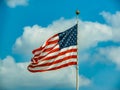 Waving American Flag on a pole Royalty Free Stock Photo