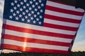 Waving American Flag on sun Background. Flag of the united states of America. July 4th Independence Memorial Day. USA Royalty Free Stock Photo