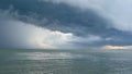 Waving blue sea, sandy shore of Koh Samui Island during wet rain season, Thailand. Hurricane and storm warning on exotic tropical Royalty Free Stock Photo