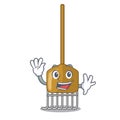 Waving cartoon rake leaves with wooden stick Royalty Free Stock Photo