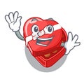 Waving choclate heart box in shape mascot