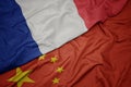 waving colorful flag of china and national flag of france Royalty Free Stock Photo