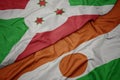 waving colorful flag of niger and national flag of burundi Royalty Free Stock Photo