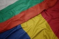 waving colorful flag of romania and national flag of bulgaria Royalty Free Stock Photo