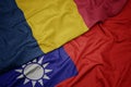 waving colorful flag of taiwan and national flag of chad